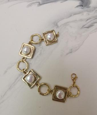 bracciale-in-bronzo-giallo-con