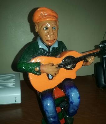 il-signore-con-la-chitarra