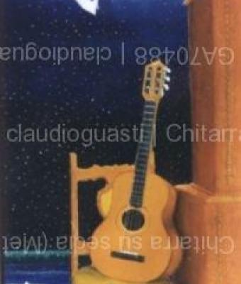chitarra-su-sedia-metafisica
