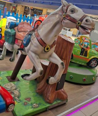 white-mechanical-horse-kiddie