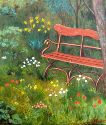 panchina-rossa-in-un-giardino