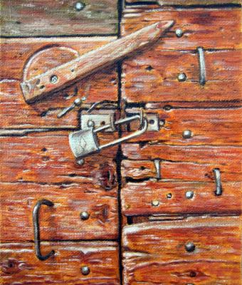 porta-con-lucchetto-nel-borgo