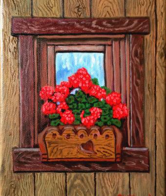 finestra-fiorita-sullo-chalet