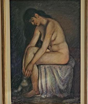 nudo-seduto