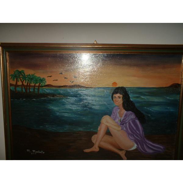 donna-in-scogliera-al-tramonto
