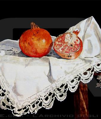 melograni-su-merletto-bianco