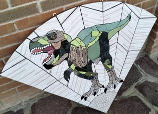 dinosauro-su-un-quadro-a-forma